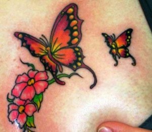 fotos-tatuagens-femininas-nas-costas-delicadas-300x261